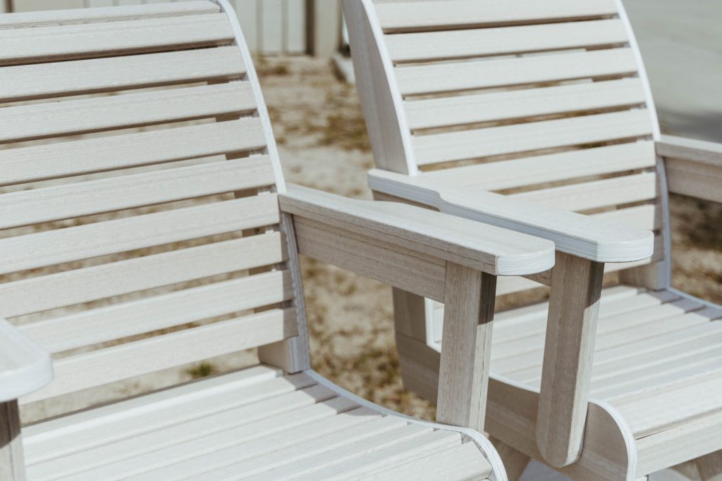 Two Seashell polywood chairs sitting side by side