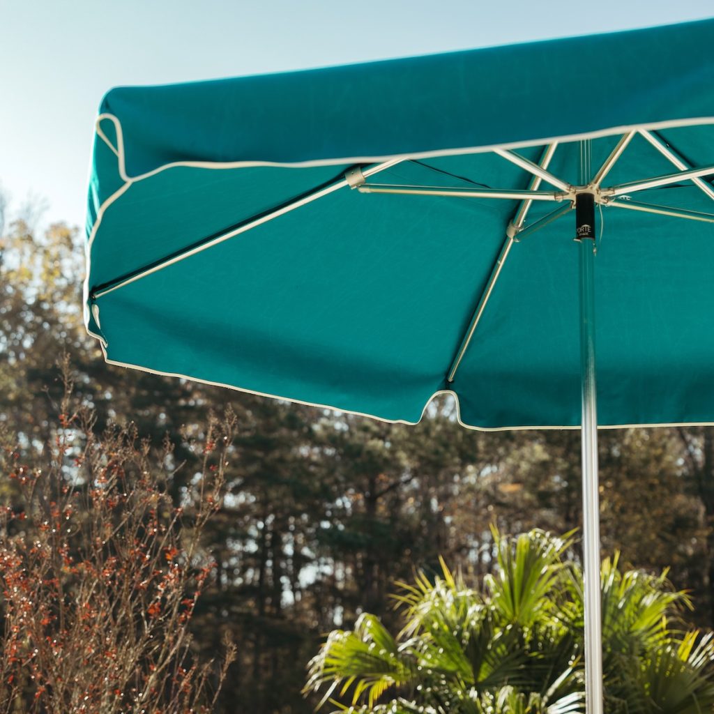 LaPorte Cool Shade Umbrella with a Persian Green Sunbrella Canopy and Anodized Aluminum frame.