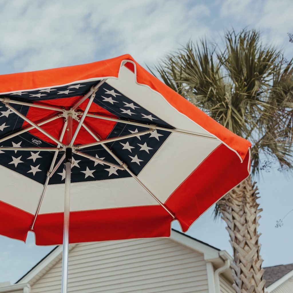 LaPorte Palmetto umbrella with anodized aluminum frame and replaceable components for long-term outdoor use.
