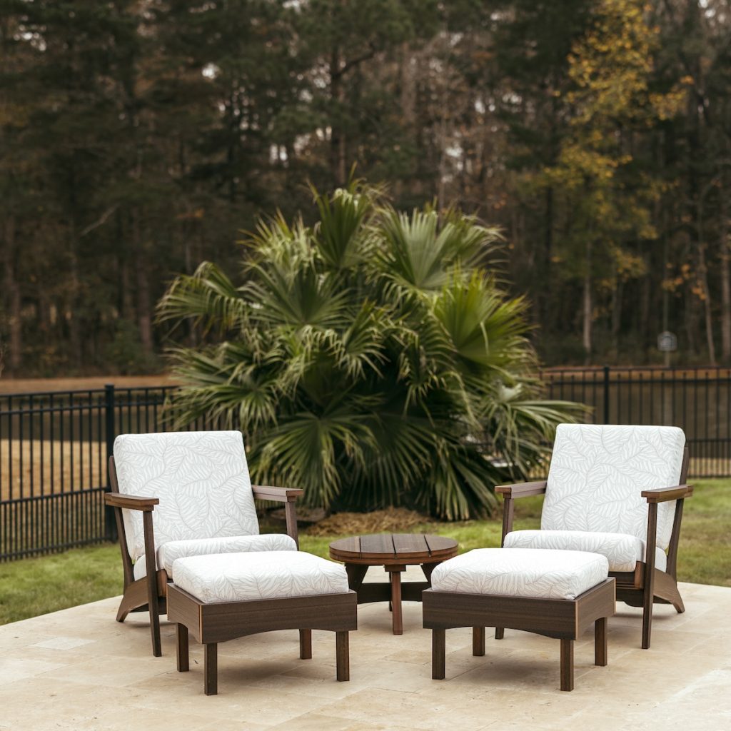 Oasis Collection poolside furniture creating a comfortable and inviting outdoor lounge area.