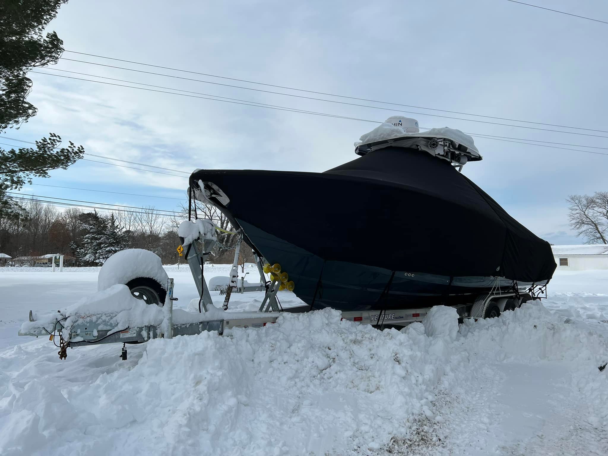 Boat covered and prepped for winter storage.